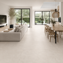 Vloertegel betonlook Concrete Desert 100 x 100 cm - woonkamer met zithoek en eettafel op betonlook vloer in beige