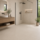 Badkamer met walk-in douche betegeld met New Tiles Etna Crema 100 x 100 cm vloertegels